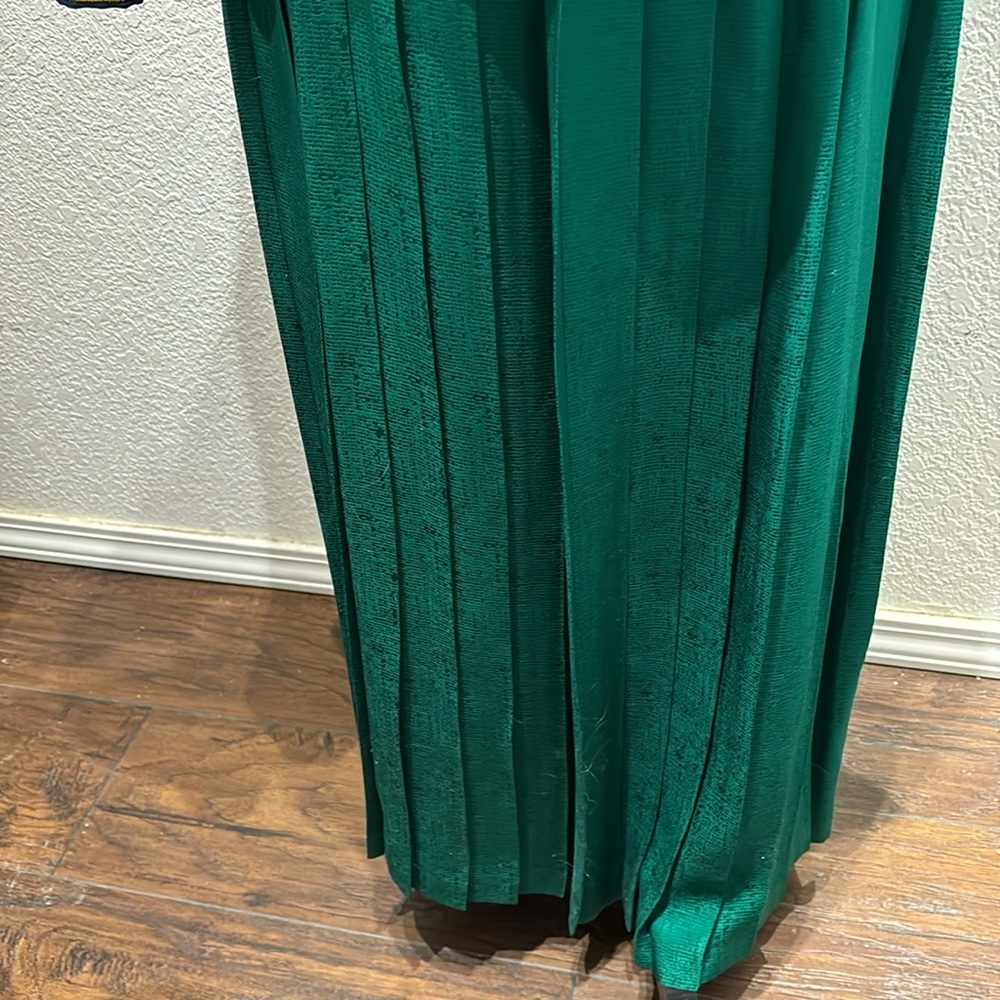 100% silk blazer and skirt size 12. Great condition. Beautiful jewel colors.